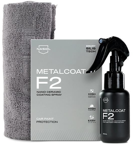 NASIOL Metalcoat F2 nano ceramic coating spray kit with a grey box, black spray bottle, and a folded grey towel beside it for car paint protection
